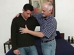 Hot tanned gay stud in jeans gets his dick sucked by gay daddy