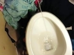 Pissing while jacking off my cock wishing I had a bitchs mouth to piss in