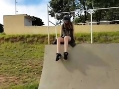 Naughty amateur teen plays with her tight cunt in the park