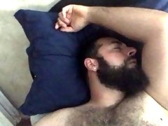 Big bearded bear with hairy chest wanking playing on cam showing his tongue. Beautiful Agony