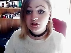 Sexy t-girl with piercings shows her small tits